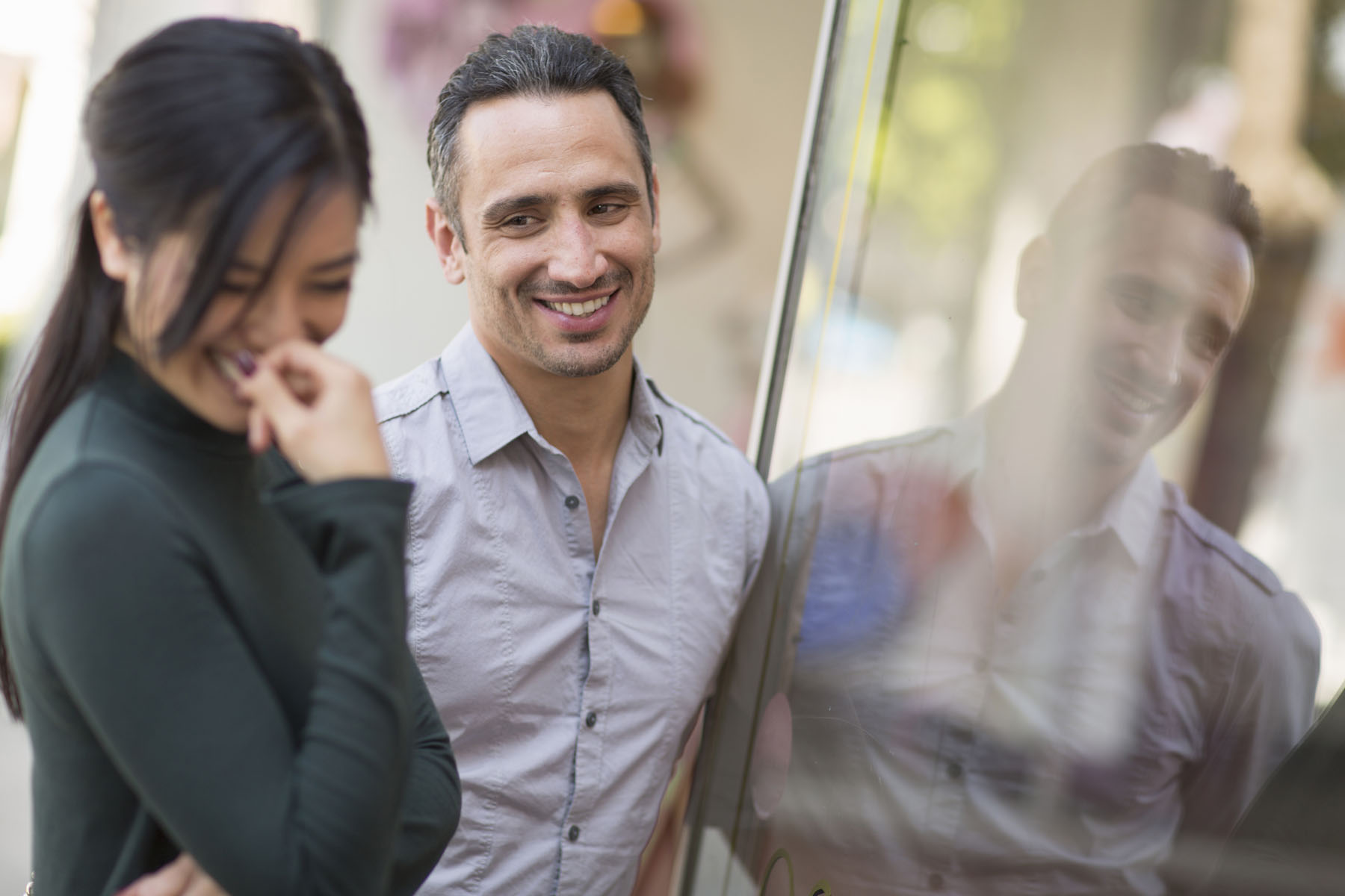 Couple through a glass window