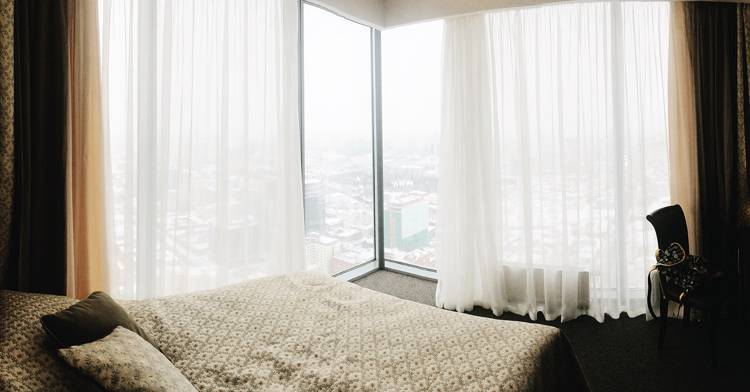 Curtains on a corner window